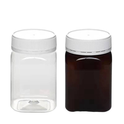 BPAの自由な320mlプラスチック食糧はふたが付いている空気のない正方形の蜂蜜のびんを震動させる